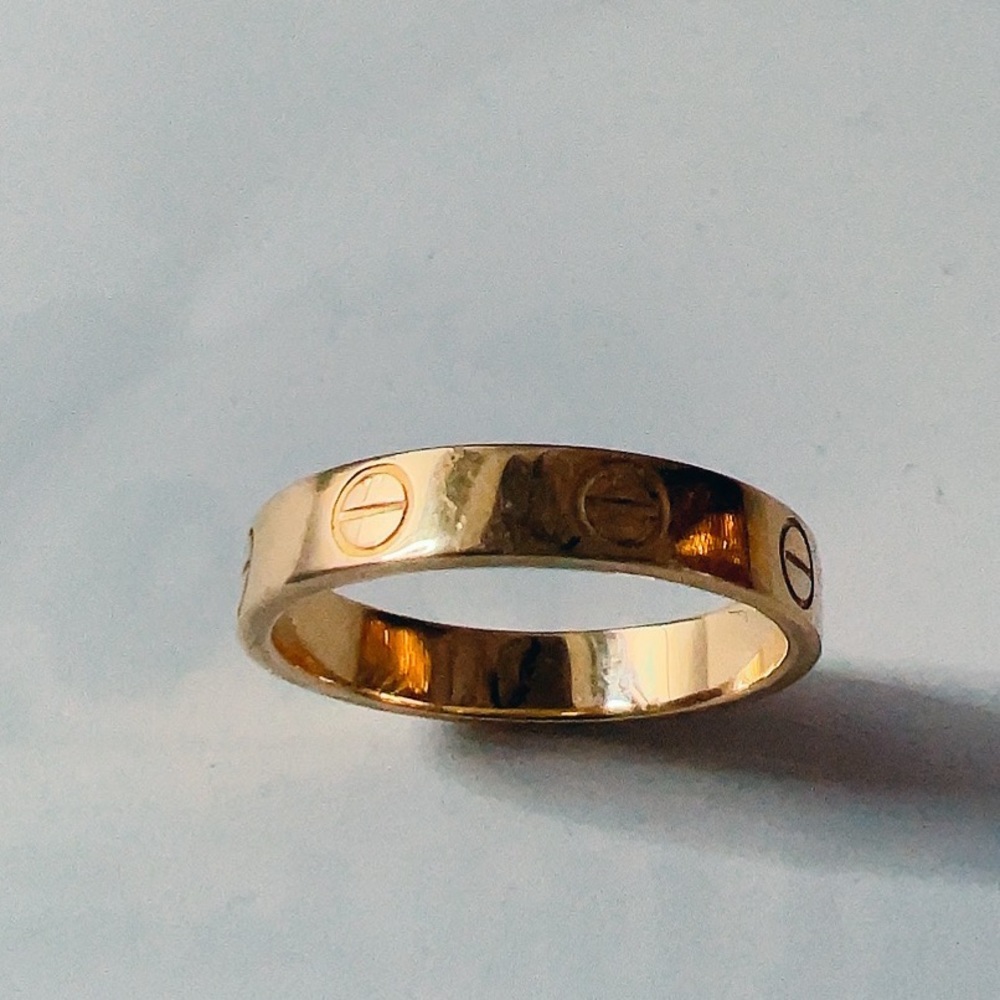 Gold Cartier mini love ring